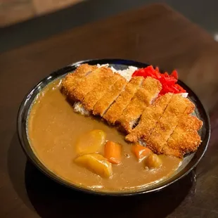 D6. Curry Chicken Katsu Don: this was good but I weirdly liked it even more as leftovers. The pickled side was so much better