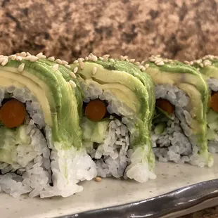 Special Veggie Roll!!  Cucumber, carrot, oshinko (pickled radish) daikon radish roll. Topped with sliced avocado!