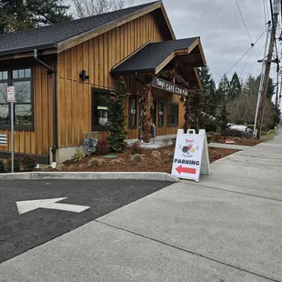 a sign in front of a restaurant