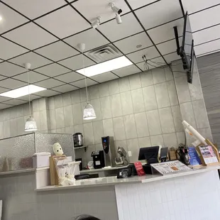 a woman sitting at a counter