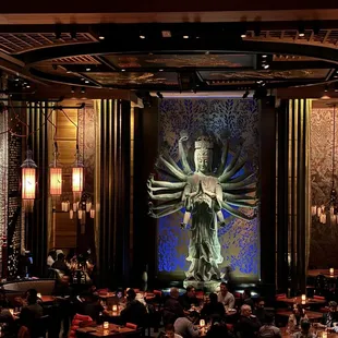 Unexpectedly huge dinning area with a beautiful Avalokiteshvara statue front and centered