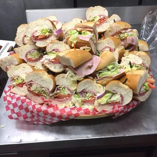 a large platter of sandwiches