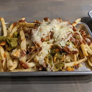 Green and red chili cheese fries