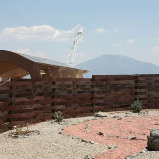 a desert setting with a building made of bricks
