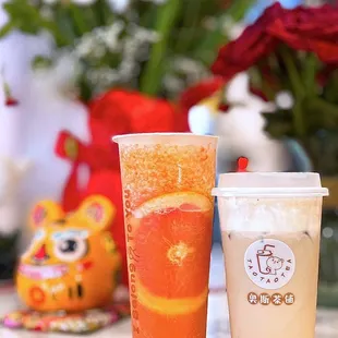 Super Grapefruit Tea (Large - $6.05) &amp; Milk Tea w/ soybean cheese foam (Small - $5.45). No sugar adjustments allowed.