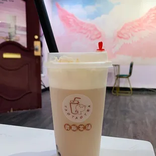 milk tea with soybean cheese top +boba