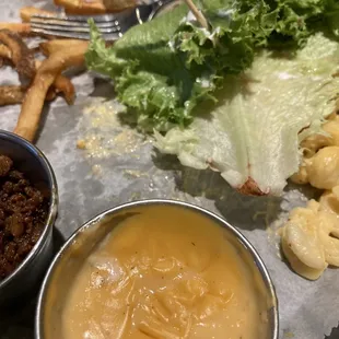 Crusty cheese and wilted browned lettuce