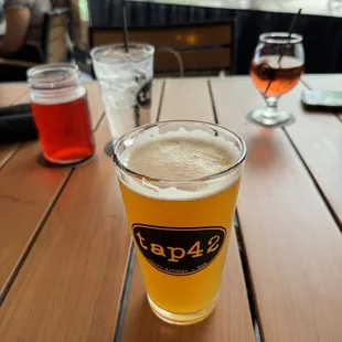 a glass of beer on a table