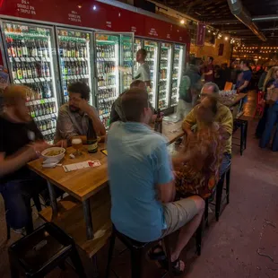 a group of people sitting at a table