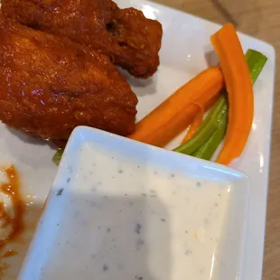chicken wings, carrots, celery and dip