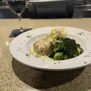 Salmon with leek cream sauce, garlic mash potatoes &amp; broccoli. The sauce really makes the dish.
