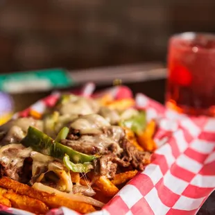 a plate of fries and a drink