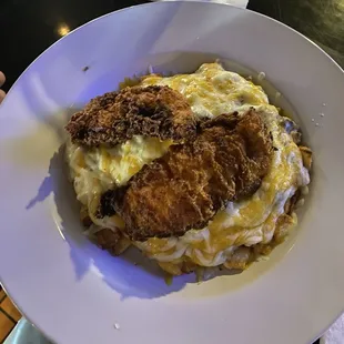 Chicken tenders bowl. Sausage gravy, hella cheese, eggs, Breakfast Done Right.