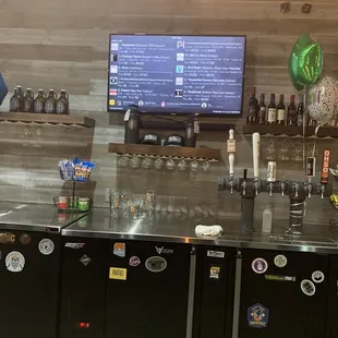 a bar with a television in the background