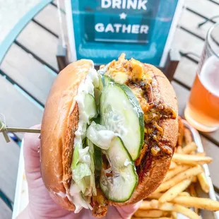 Nashville hot pulled chicken sandwich with garlic fries. Soooo good!