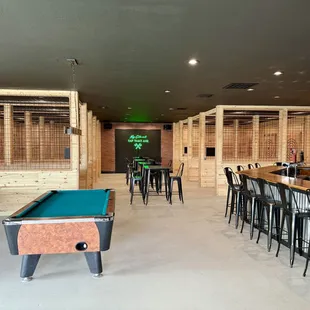 a bar with a pool table