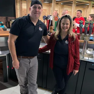 a man and a woman posing for a picture