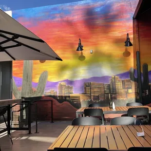 Cute outdoor patio with mural