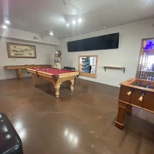 Game room in the back! Shuffleboard, foosball, pool, and a bar behind me