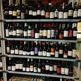 a wine rack full of wine bottles