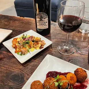 Grilled Salmon Nuggets w/lemon herb sauce (back). Goat Cheese Fritters w/fruit preserve (front).
