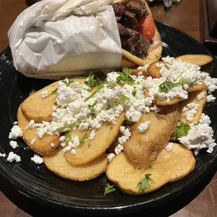 Steak Pita Pocket with Fries topped with Feta Cheese. 5/5, would definitely get again.