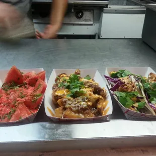 Watermelon poprocks, pulled pork fries, fried avocado taco