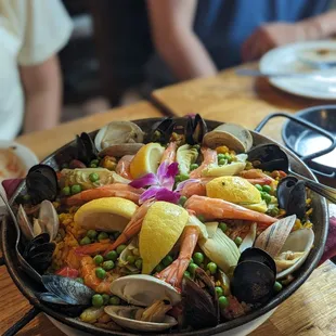 a bowl of seafood and rice