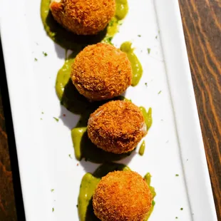 Croquetas special filled with potato, manchego,chorizo, and served with our house tomatillo sauce