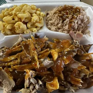 Jerk chicken with rice and beans and macaroni and cheese