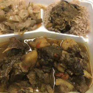 Curry goat, rice &amp; beans, cabbage w/mixed vegetables