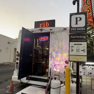 Paid meter parking lot right next to the food truck