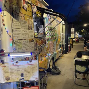 a food truck parked on the side of the road