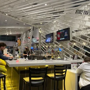 people sitting at the bar