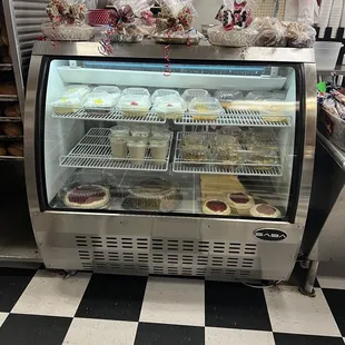 a display of cakes and pastries