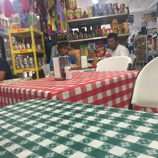 It's a cute little market with tables to sit and eat