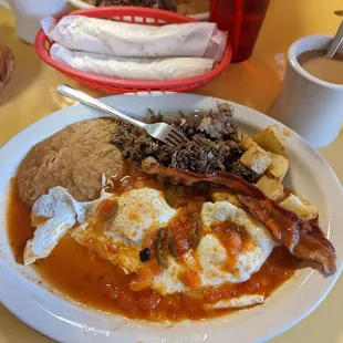 Ranchero Plate with Barbacoa and fresh flour tortillas. Delicious