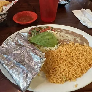 Gosh tacos. Inside the foil. Wrapped inside the foil in a flour tortilla. They were not what I expected, but the rest was great.