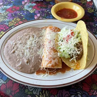 Lunch Special #1  7.25 One burrito, one taco and served with rice or refried beans