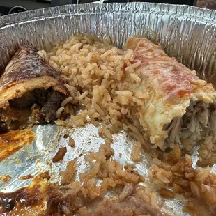 Inside of enchilada and burrito filled with meat and chicken