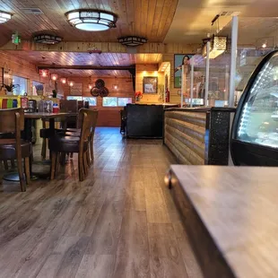 Inside with the baked goods case on the right.