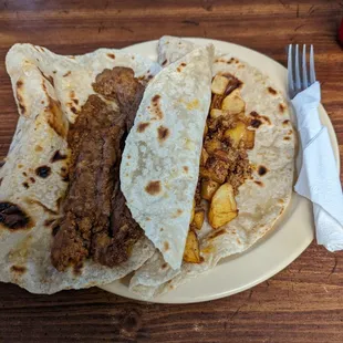 Chorizo and bean and chorizo and potato tacos
