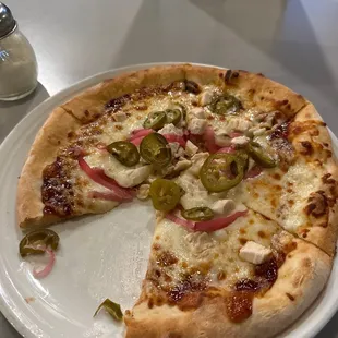 All toppings in the center, sauce near crust edge