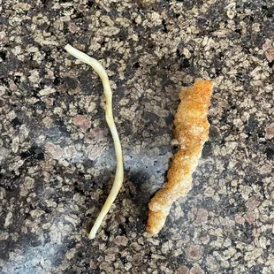 Suppose to be Calamari but instead looks like rubber and the fried flour they used.