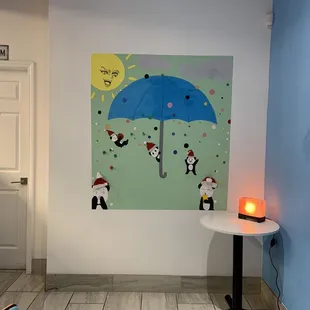 a table with a blue umbrella