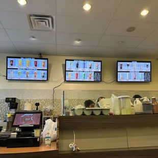 two televisions above the counter