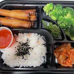 Korean kimchi, very tasty Taiwanese popcon chicken, and seaweed salad