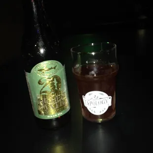 a bottle and a glass