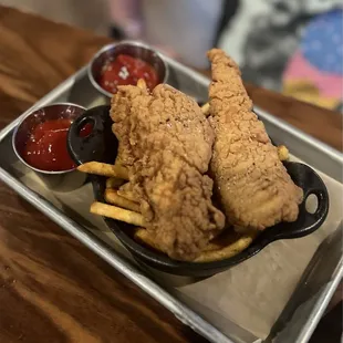 Kids&apos; chicken strips. 2 thumbs up.