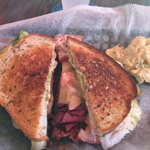 Pastrami on rye, side of potatoe salad and pickle. Omg, BEST SANDWICH!!